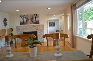 Dining room view of the fireplace.